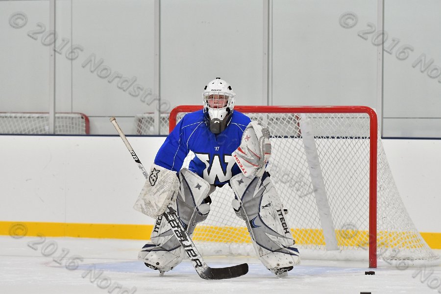 Wheaton College Men\'s Ice Hockey vs Middlesex Community College. - Photo By: KEITH NORDSTROM